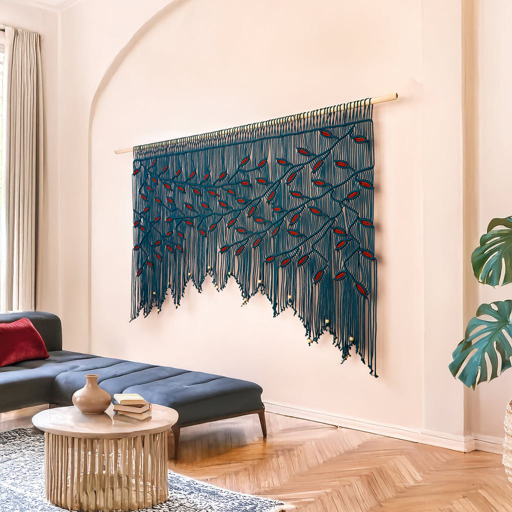 Decorative wall hanging with blue and red pattern in a living room setting.