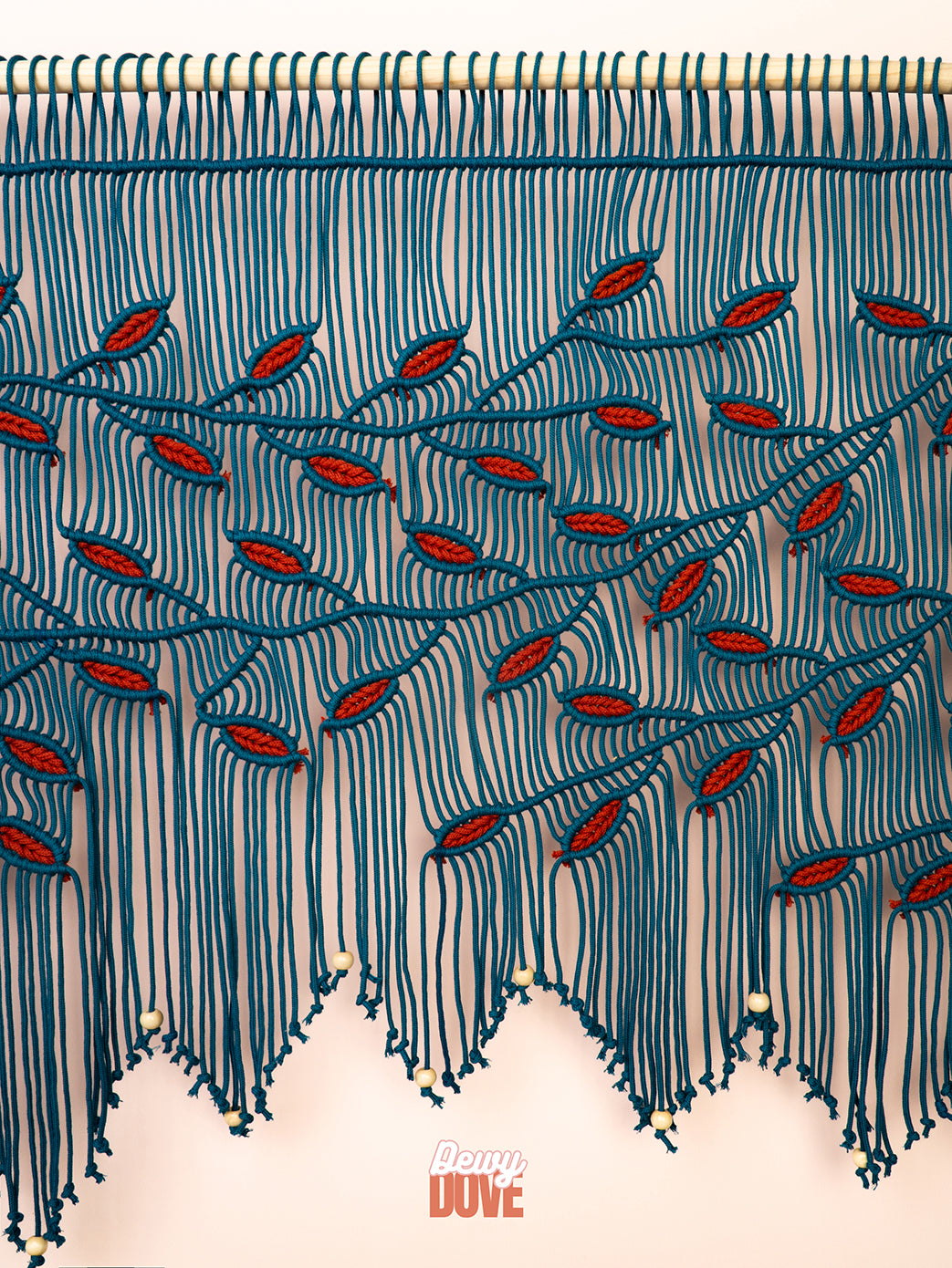 Textured fabric with embroidered pattern and 'Dewy' brand logo.