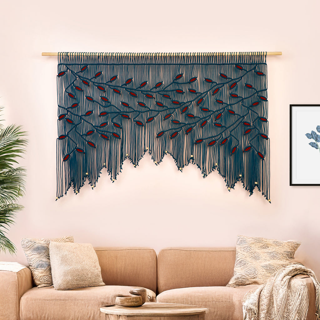 Unique teal macrame valance with a staggered botanical design and high-contrast red texture.