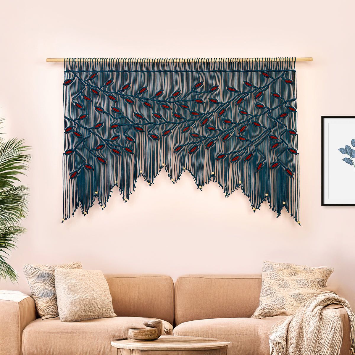 Unique teal macrame valance with a staggered botanical design and high-contrast red texture.